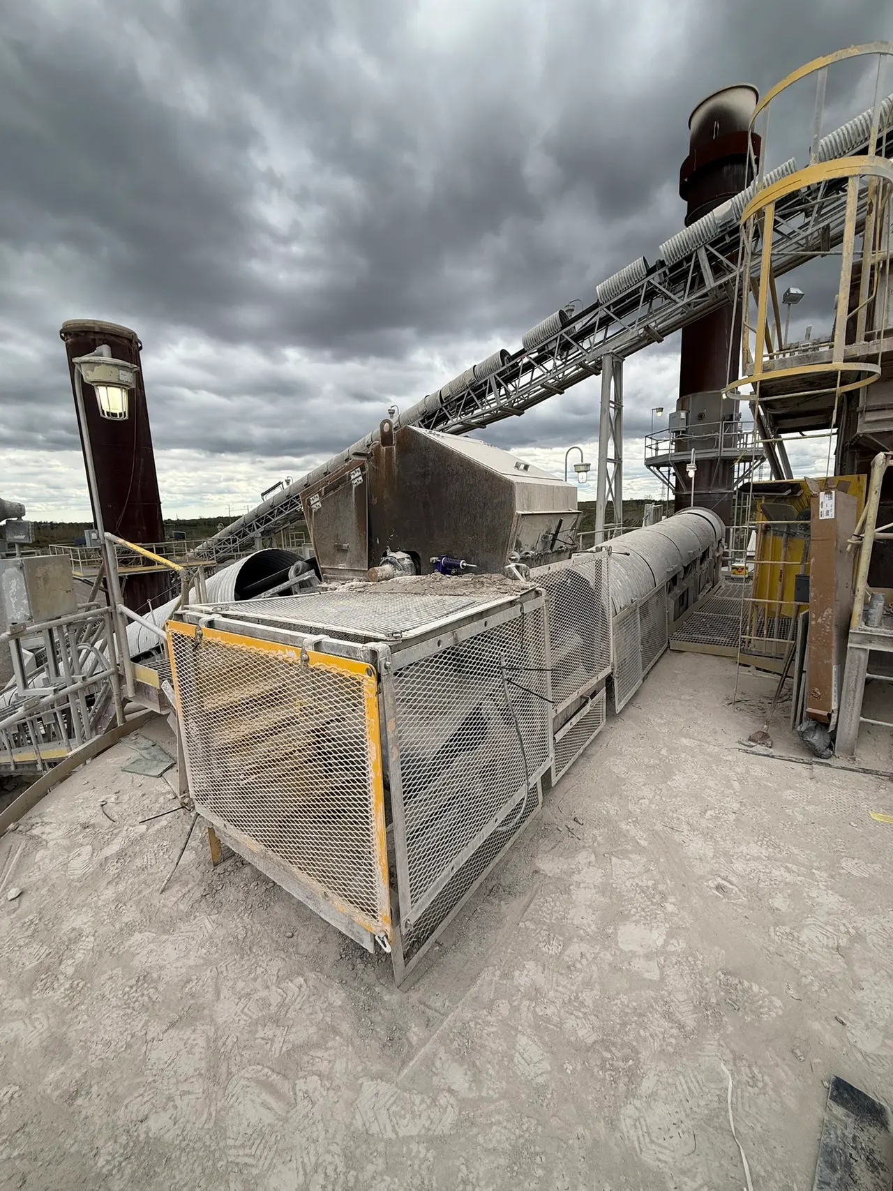 Conveyor and steel machinery at an aggregate processing plant
