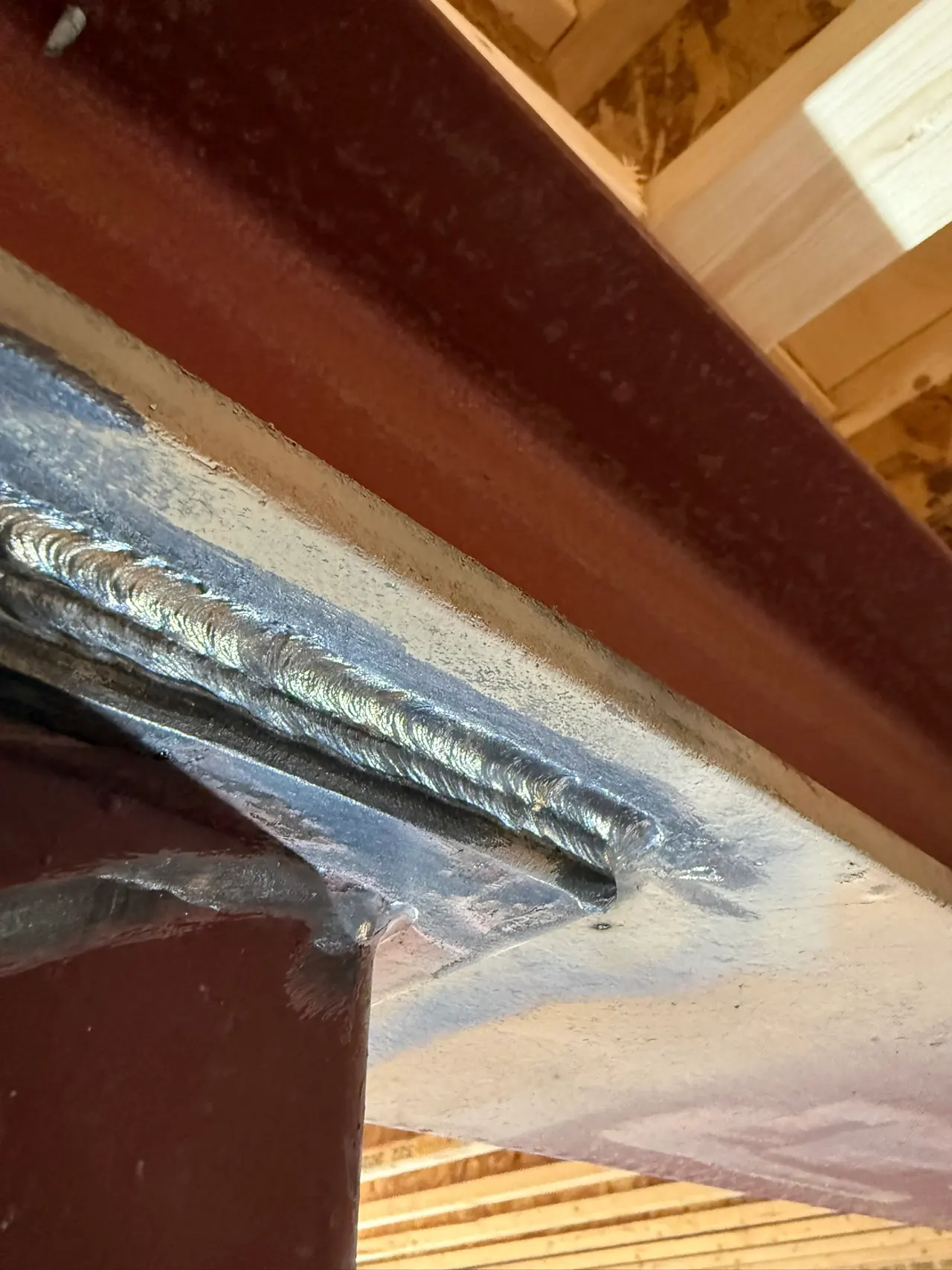 Welded structural steel connection between a beam and a square post